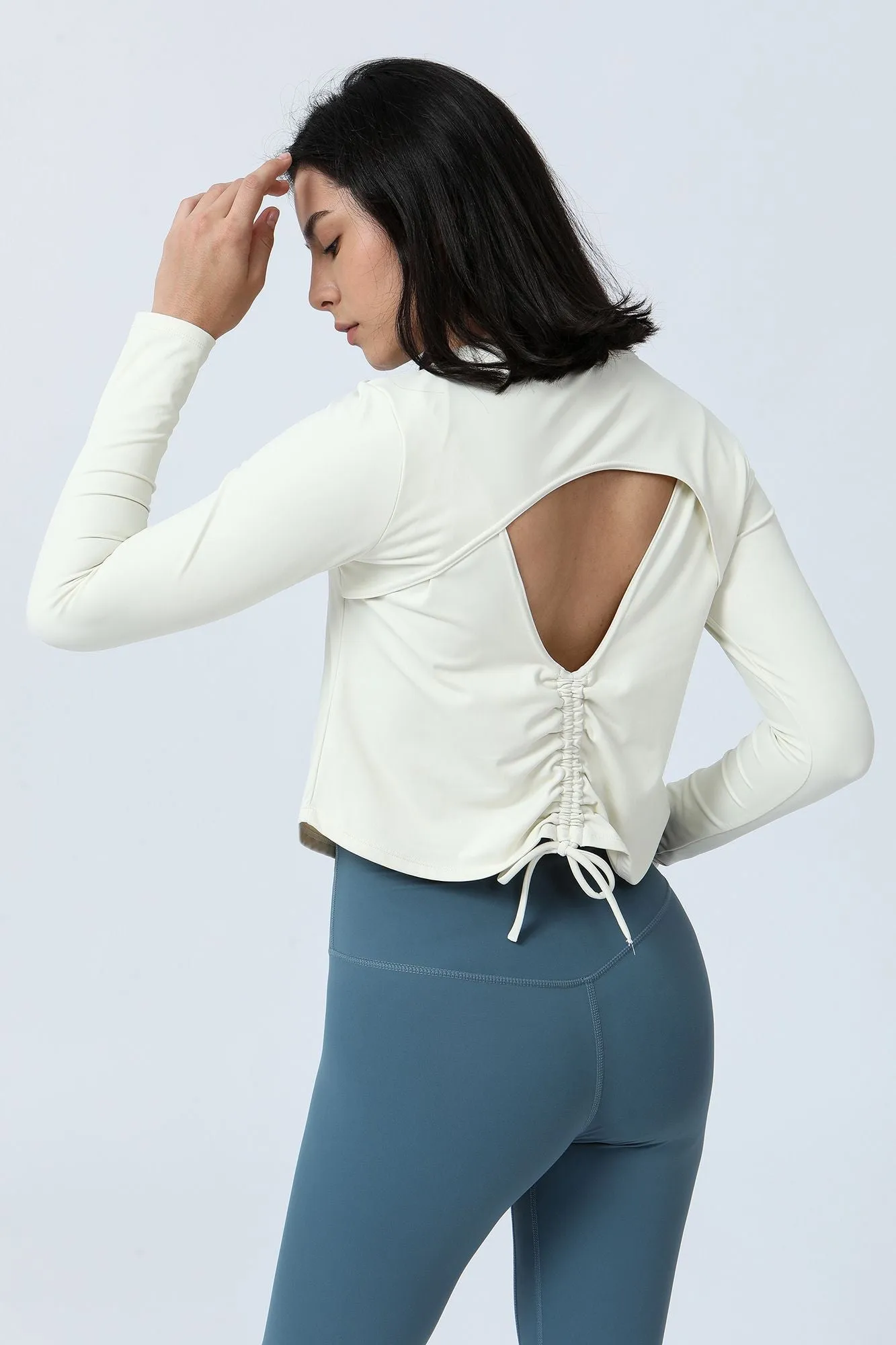 Long Sleeve Ruched Back Cutout Crop Top