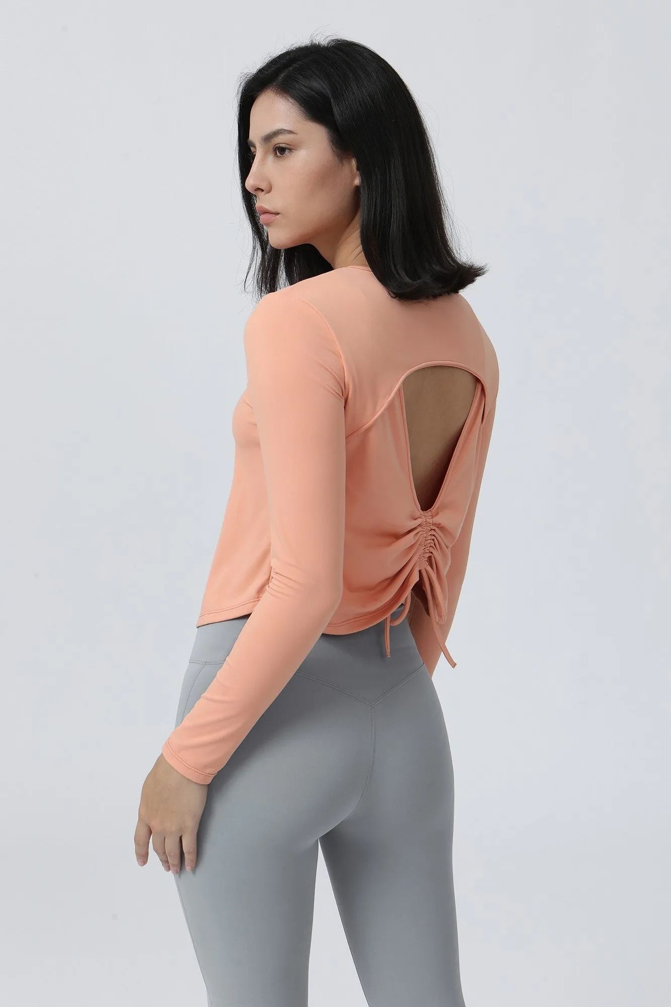 Long Sleeve Ruched Back Cutout Crop Top